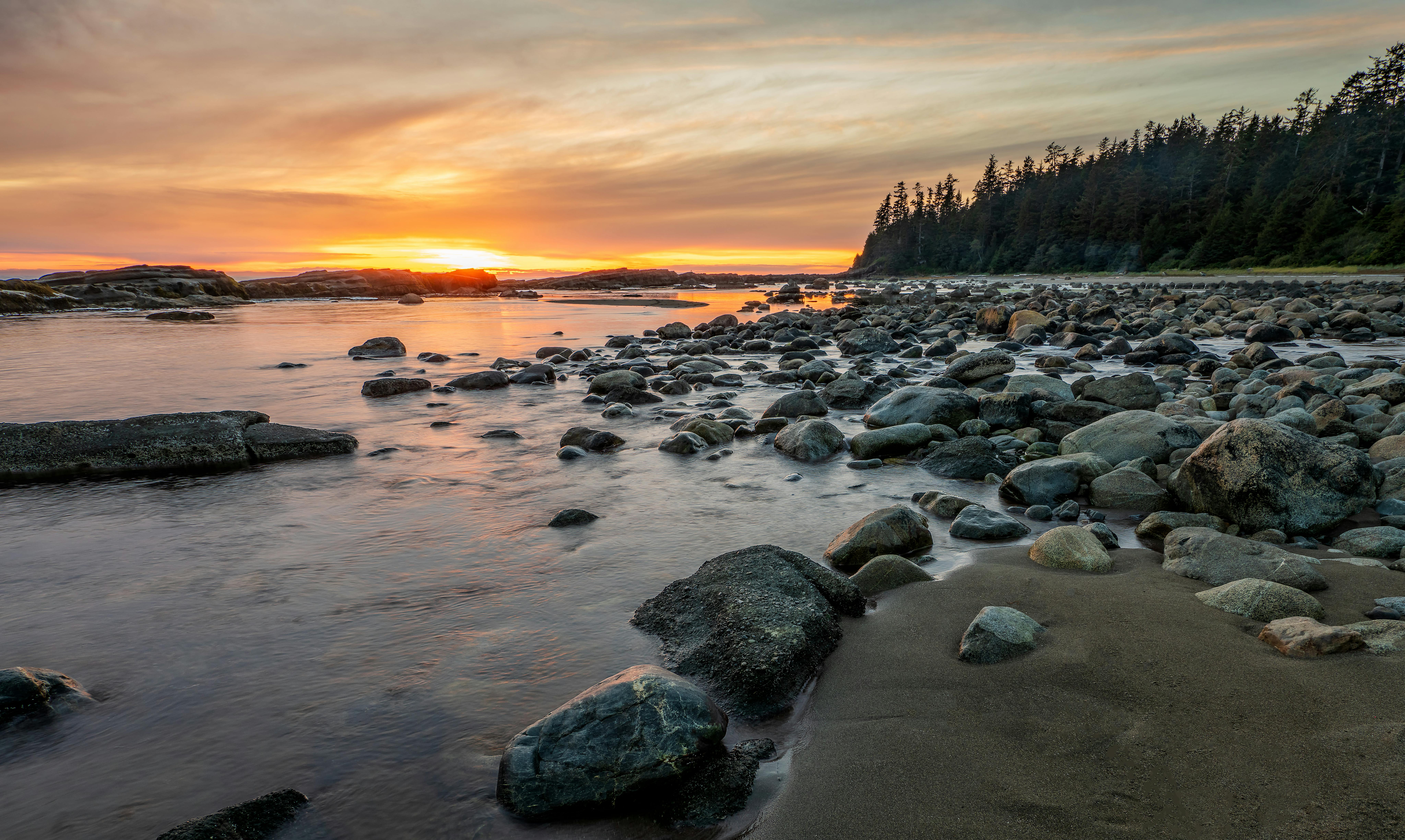 Beautiful sunset over rocky beach